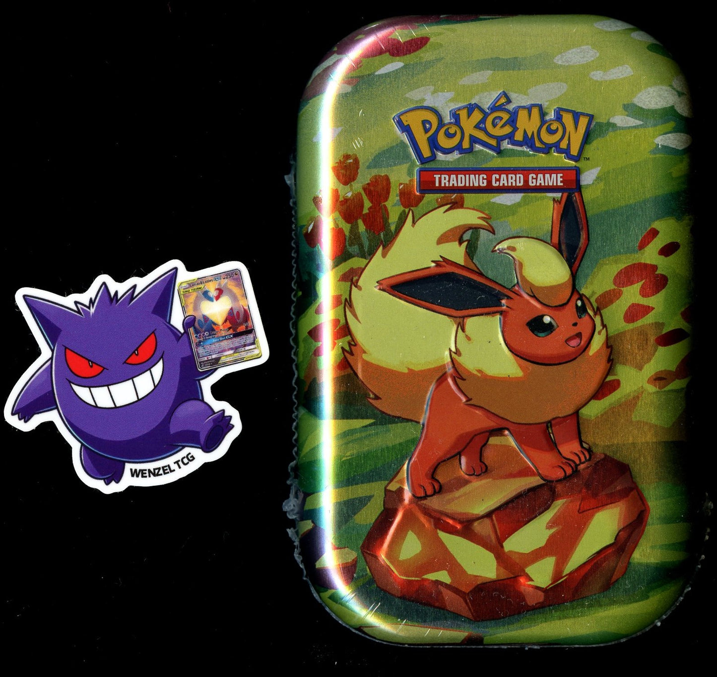 Prismatic Evolutions Mini Tin
